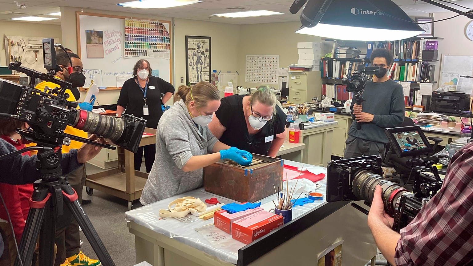 Virginia state conservators work on a box believed to be a time capsule left in the pedestal at the former site of a statue of Confederate Gen. Robert E. Lee in Richmond.