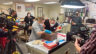 Virginia state conservators work on a box believed to be a time capsule left in the pedestal at the former site of a statue of Confederate Gen. Robert E. Lee in Richmond.