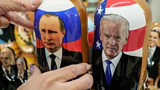 Traditional Russian wooden dolls of Russian President Vladimir Putin and US President Joe Biden at a souvenirs store in Moscow, Russia, on Dec. 6, 2021. 