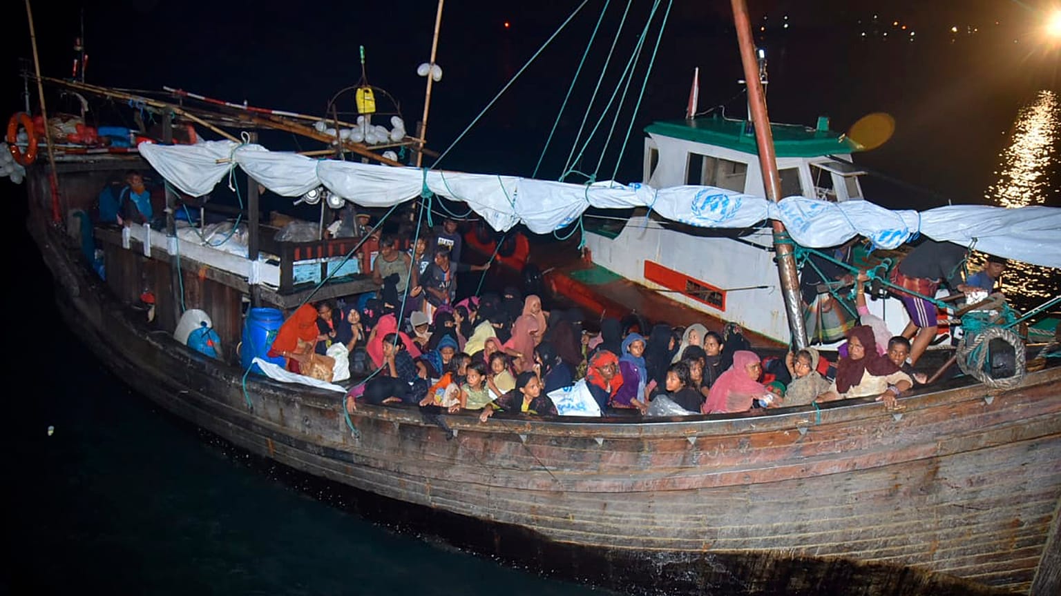 120 Rohingya refugees disembark in Indonesia port