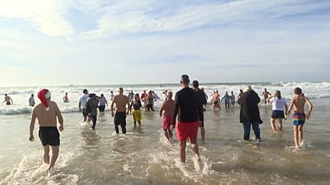 Bathers entering the water
