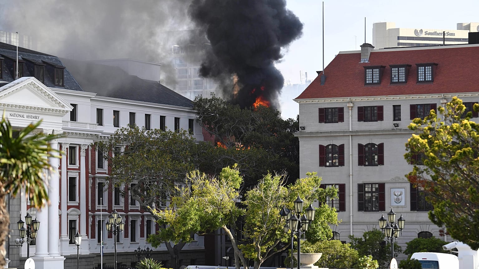A fire burns at the Houses of Parliament, in Cape Town, South Africa, Jan. 2, 2022. 