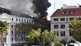 A fire burns at the Houses of Parliament, in Cape Town, South Africa, Jan. 2, 2022. 