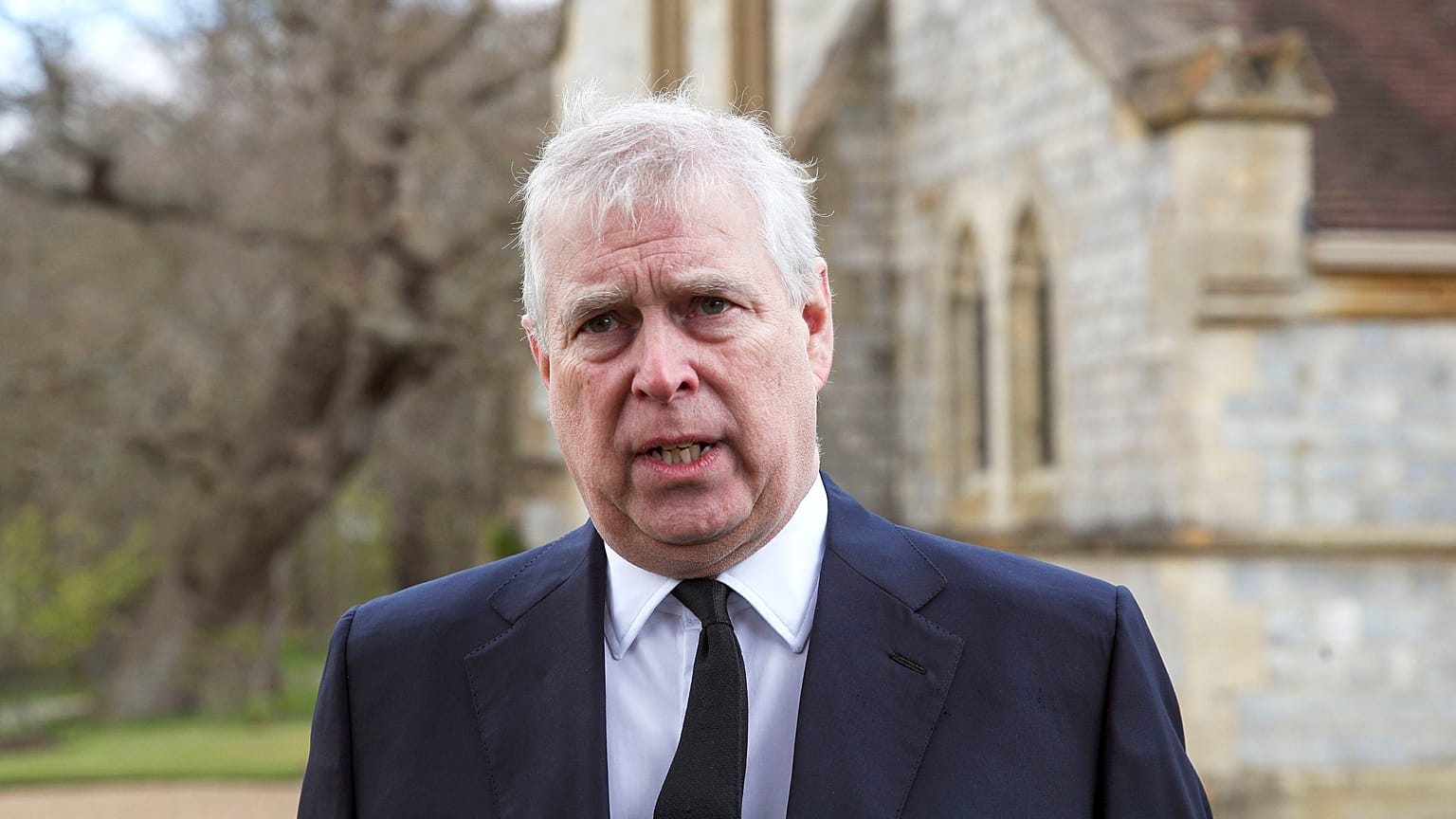 In this April 11, 2021, photo, Britain's Prince Andrew speaks. during a television interview at the Royal Chapel of All Saints at Royal Lodge, Windsor, England.