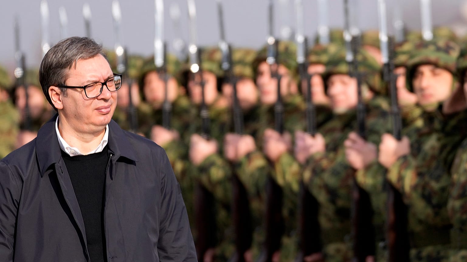 Serbia's President Aleksandar Vučić reviews the honour guard during a welcoming ceremony at the army barracks near Belgrade