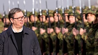 Serbia's President Aleksandar Vučić reviews the honour guard during a welcoming ceremony at the army barracks near Belgrade