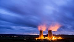 Steam rises from the cooling towers of the Grohnde nuclear power plant near Grohnde, Germany, Wednesday, Dec. 29, 2021.