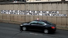 Posters read "Delphine, 33, strangled by her husband Reanud. Their four children were present. 115th feminicide" in Paris, Wednesday, Nov. 6, 2019.