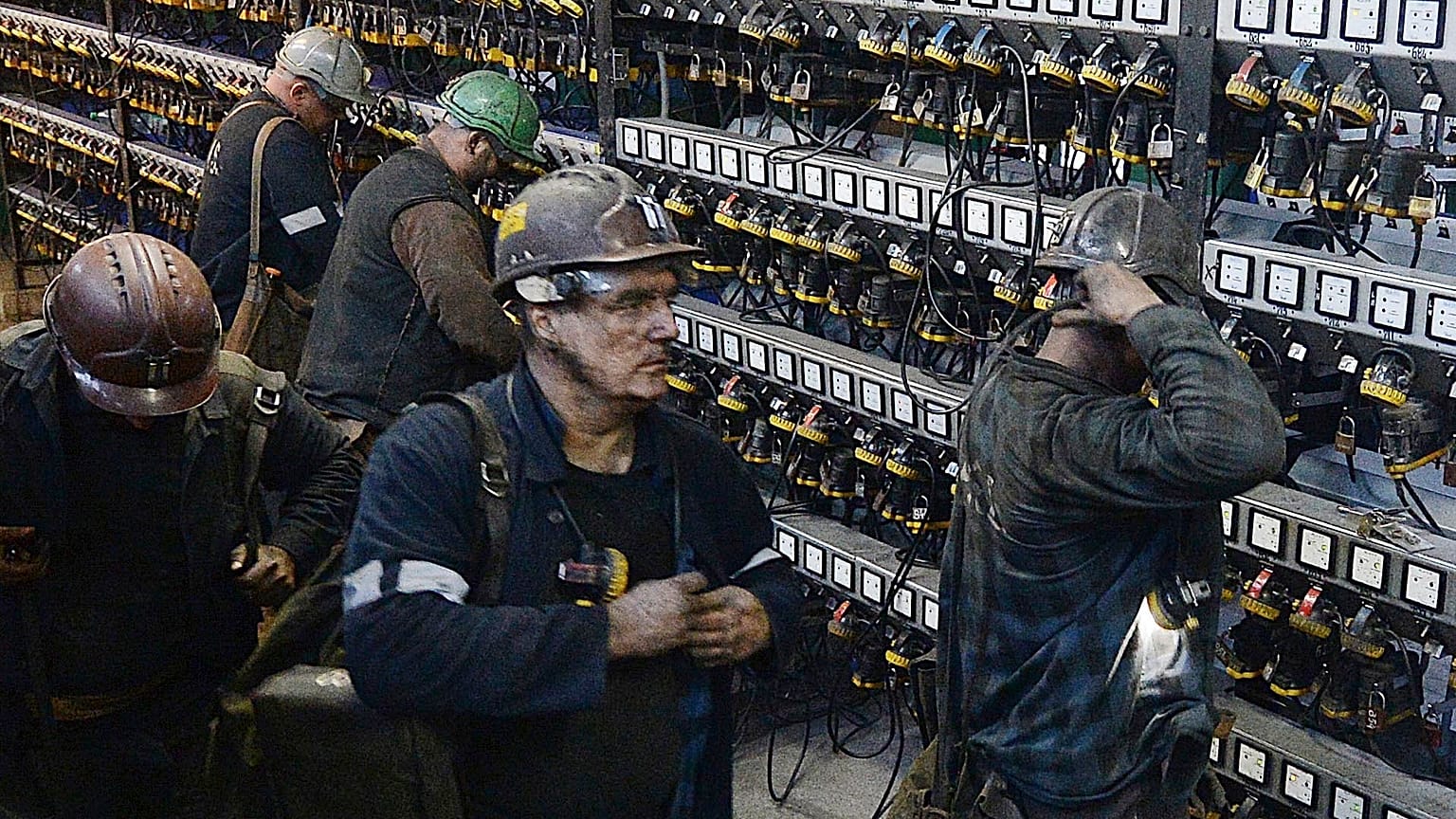 miners put away their equipment after an underground shift at the Wujek coal mine in Katowice, Poland, Nov. 21, 2018.