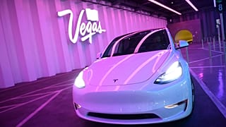 A Tesla Inc. electric vehicle waits to transport passengers through the Las Vegas Convention Center Loop ahead of the Consumer Electronics Show (CES)