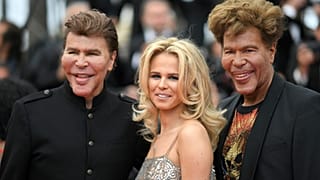 Igor Bogdanoff (R) and his partner Julie (C) and twin-brother Grichka Bogdanoff (L) arrive at the 71st edition of the Cannes Film Festival on May 15, 2018.