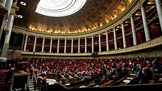 Parliament members attend a session of questions to the Government at the French National Assembly in Paris, France, Jan. 4, 2022. 