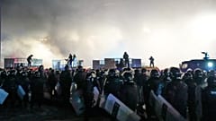 Riot police block protesters in the center of Almaty, Kazakhstan, Wednesday, Jan. 5, 2022. 