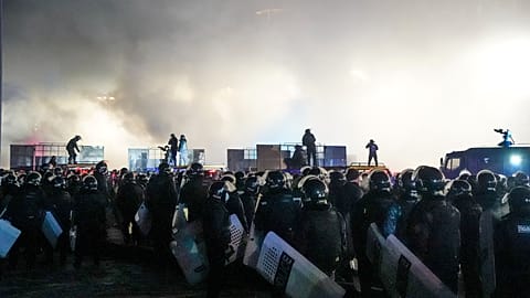 Riot police block protesters in the center of Almaty, Kazakhstan, Wednesday, Jan. 5, 2022. 