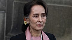  Myanmar's leader Aung San Suu Kyi leaves the International Court of Justice after the first day of three days of hearings in The Hague, Netherlands, on Dec. 10, 2019. 