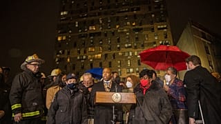 New York City Mayor Eric Adams speaks during a news conference outside an apartment building where a deadly fire occurred in the Bronx on Sunday, Jan. 9, 2022, in New York.