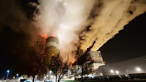 In this Nov. 28, 2018 file photo, clouds of smoke are pictured over Europe's largest lignite power plant in Belchatow, central Poland.