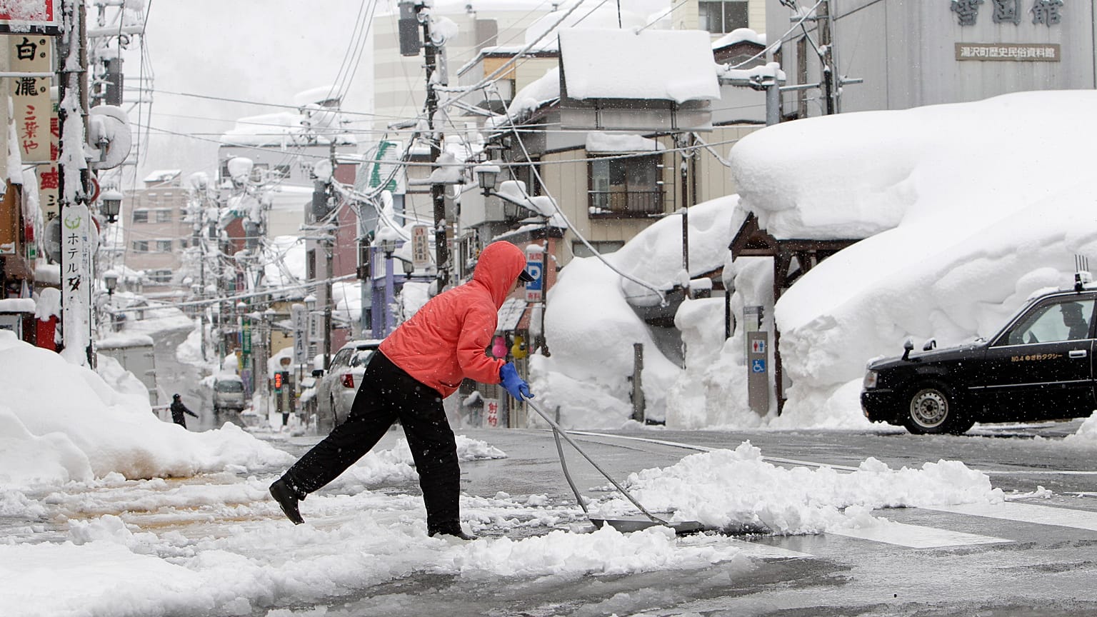 Snowstorms hit Japan`s northern Hokkaido and northeastern region of Tohoku
