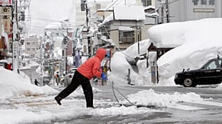 Snowstorms hit Japan`s northern Hokkaido and northeastern region of Tohoku