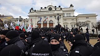 A heavy police presence prevented protesters from entering the building.
