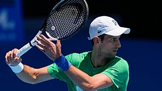 Defending men's champion Serbia's Novak Djokovic practices on Margaret Court Arena ahead of the Australian Open tennis championship in Melbourne, Australia, Jan. 13, 2022.