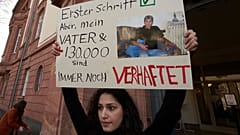 Serda Alshehabi comments on the verdict in front of the building of the Higher Regional Court in Koblenz, Germany, Feb. 24, 2021