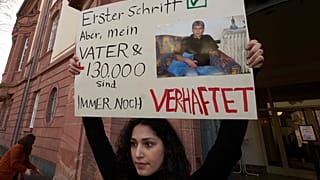 Serda Alshehabi comments on the verdict in front of the building of the Higher Regional Court in Koblenz, Germany, Feb. 24, 2021