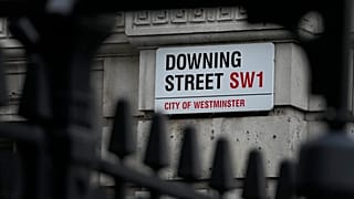 A Downing Street sign is fixed at the entrance in London, Tuesday, Jan. 11, 2022. 