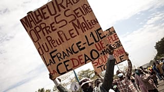 Pancarte brandie lors du rassemblement organisé à Bamako ce vendredi 14/01/2022