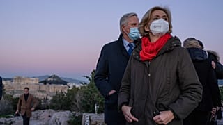 Les Republicains candidate for the French presidential election, Valerie Pecresse, right, stands at the Philopappos hills in Athens, 14 January 2022.