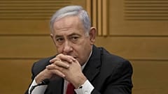 Former Israeli prime minister Benjamin Netanyahu speaks to right-wing opposition party members, at the Knesset in Jerusalem