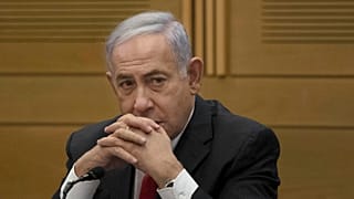 Former Israeli prime minister Benjamin Netanyahu speaks to right-wing opposition party members, at the Knesset in Jerusalem