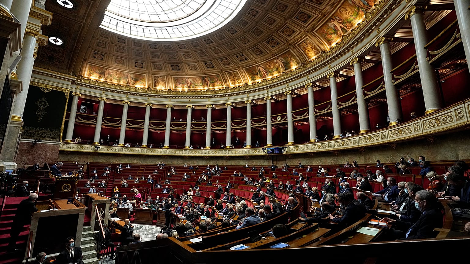 Parliament members attend a session of questions to the Government at the French National Assembly in Paris