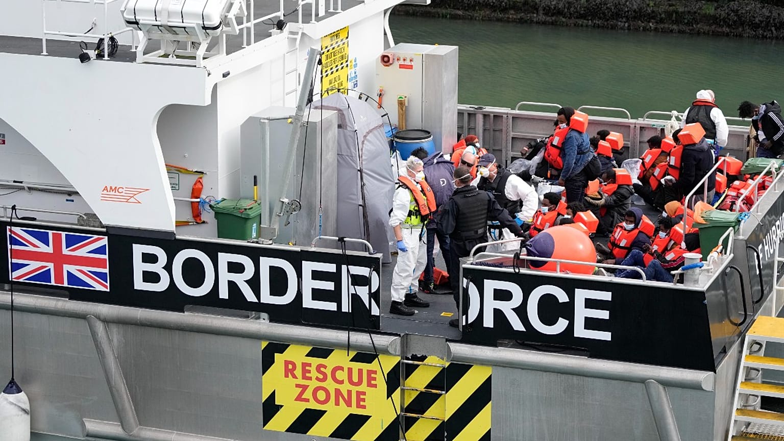 Migrants who made the crossing from France are brought into port after being picked up in the Channel by a British border force vessel in Dover, England, August 13, 2021.