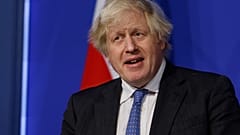 Britain's Prime Minister Boris Johnson speaks during a media briefing on COVID-19, in Downing Street, London, Dec. 15, 2021. 