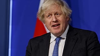 Britain's Prime Minister Boris Johnson speaks during a media briefing on COVID-19, in Downing Street, London, Dec. 15, 2021.