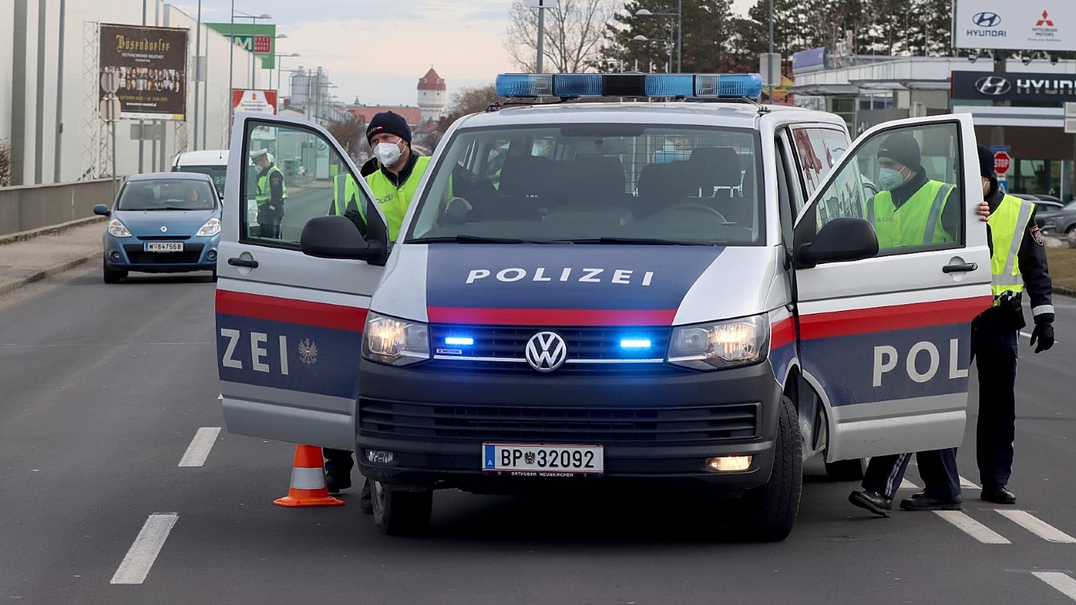 Police check people who want to leave Wiener Neustadt, Austria, March 13, 2021. 