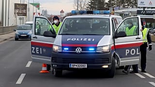 Police check people who want to leave Wiener Neustadt, Austria, March 13, 2021. 