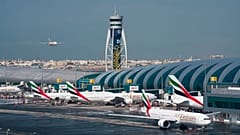 An Emirates jetliner comes in for landing at the Dubai International Airport in Dubai, United Arab Emirates.