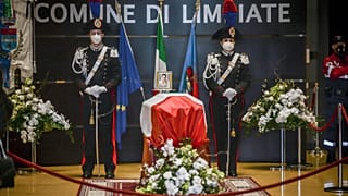 Carabinieri officers stand by the coffin of Luca Attanasio in Limbiate last February.