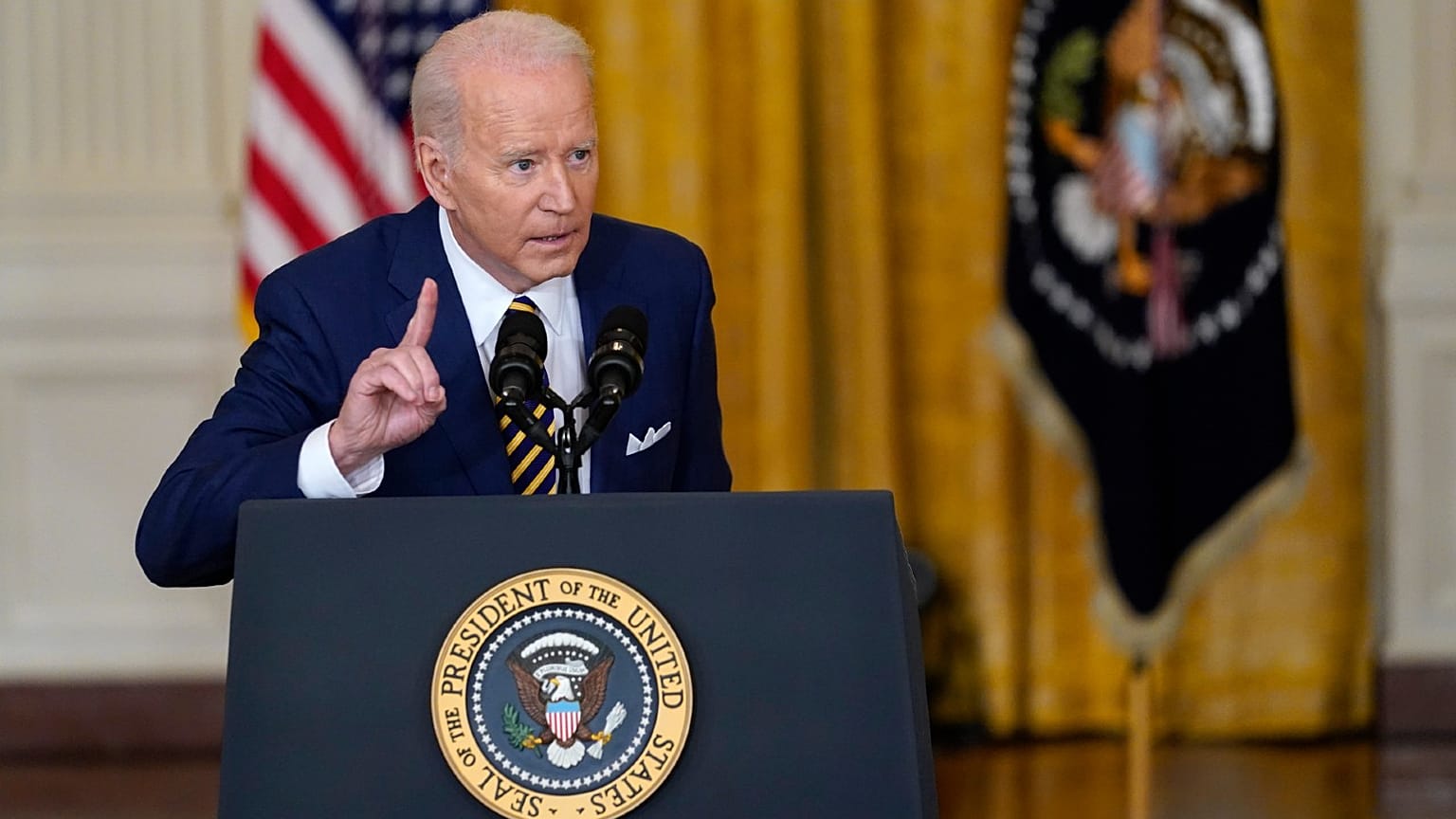 President Joe Biden speaks during a news conference in the East Room of the White House in Washington, Jan. 19, 2022.