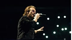 U2's frontman squirms at the sound of his voice on the band's 1980 debut
