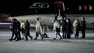 Representatives of the Taliban arrive in Gardermoen, Norway, Saturday, Jan. 22, 2022. A Taliban delegation has traveled to Norway for talks.