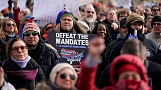 Protesters gather for an anti-vaccine rally in front of the Lincoln Memorial in Washington, Sunday, Jan. 23, 2022. 