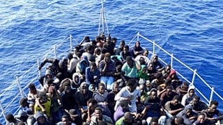 African migrants who were on boats in distress in the Mediterranean on their way to Europe, and rescued by the Libyan coast guard arrive to shore, east of the capital, Tripoli