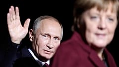 Президент России Владимир Путин и бывший канцлер Германии Ангела Меркель