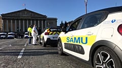Members of France's medical emergency service Samu demonstrate outside the National Assembly