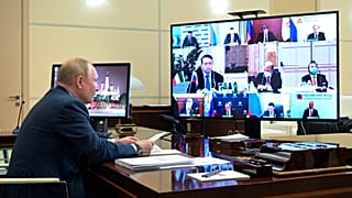 Russian President Vladimir Putin chairs a meeting with Italian businessmen via videoconference at the Novo-Ogaryovo residence outside Moscow, Russia, Wednesday, Jan. 26, 2022.