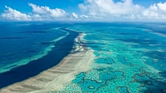 In this photo provided by the Great Barrier Reef Marine Park Authority the Hardy Reef is viewed from the air near the Whitsunday Islands, Australia, June 22, 2014. 