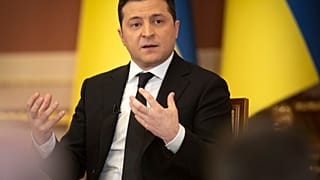 In this handout photo provided by the Ukrainian Presidential Press Office, Ukrainian President Volodymyr Zelenskyy speaks during a news conference in Kyiv, Jan. 28, 2022.